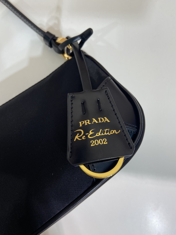 Prada Re-Edition bag-23.5*10*5CM [1BC201] CELINE CHANEL ACCESSORIES LOEWE SHOES LOUIS VUITTON DIRO YSL OTHER BRAND HANDBAGS BALENCIAGA BOTTEGA VENETA GOYARD HERMES BURBERRY VALENTINO GUCCI FENDI MIUMIU CHLOE PRADA BVLGARI SUITCASE NEW ARRIVAL 