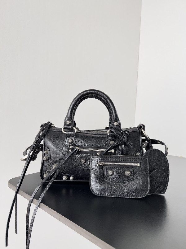 BALENCIAGA WOMEN'S LE CAGOLE MINI DUFFLE BAG IN BLACK [C1M42-070919] CELINE CHANEL ACCESSORIES LOEWE SHOES LOUIS VUITTON DIRO YSL OTHER BRAND HANDBAGS BALENCIAGA BOTTEGA VENETA GOYARD HERMES BURBERRY VALENTINO GUCCI FENDI MIUMIU CHLOE PRADA BVLGARI SUITCASE NEW ARRIVAL 