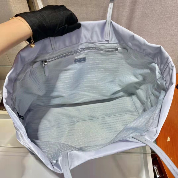 PRADA Re-Nylon and Saffiano leather tote bag [C1M1Y-063344] CELINE CHANEL ACCESSORIES LOEWE SHOES LOUIS VUITTON DIRO YSL OTHER BRAND HANDBAGS BALENCIAGA BOTTEGA VENETA GOYARD HERMES BURBERRY VALENTINO GUCCI FENDI MIUMIU CHLOE PRADA BVLGARI SUITCASE NEW ARRIVAL 