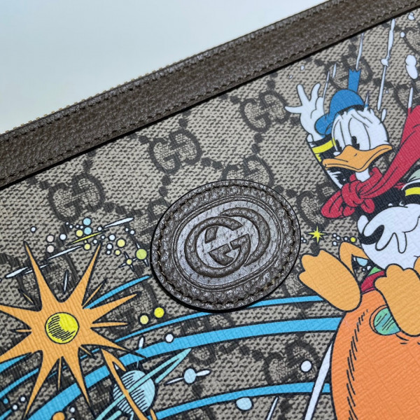 Disney x Gucci Donald Duck clutch (image for) Disney x Gucci Donald Duck clutch